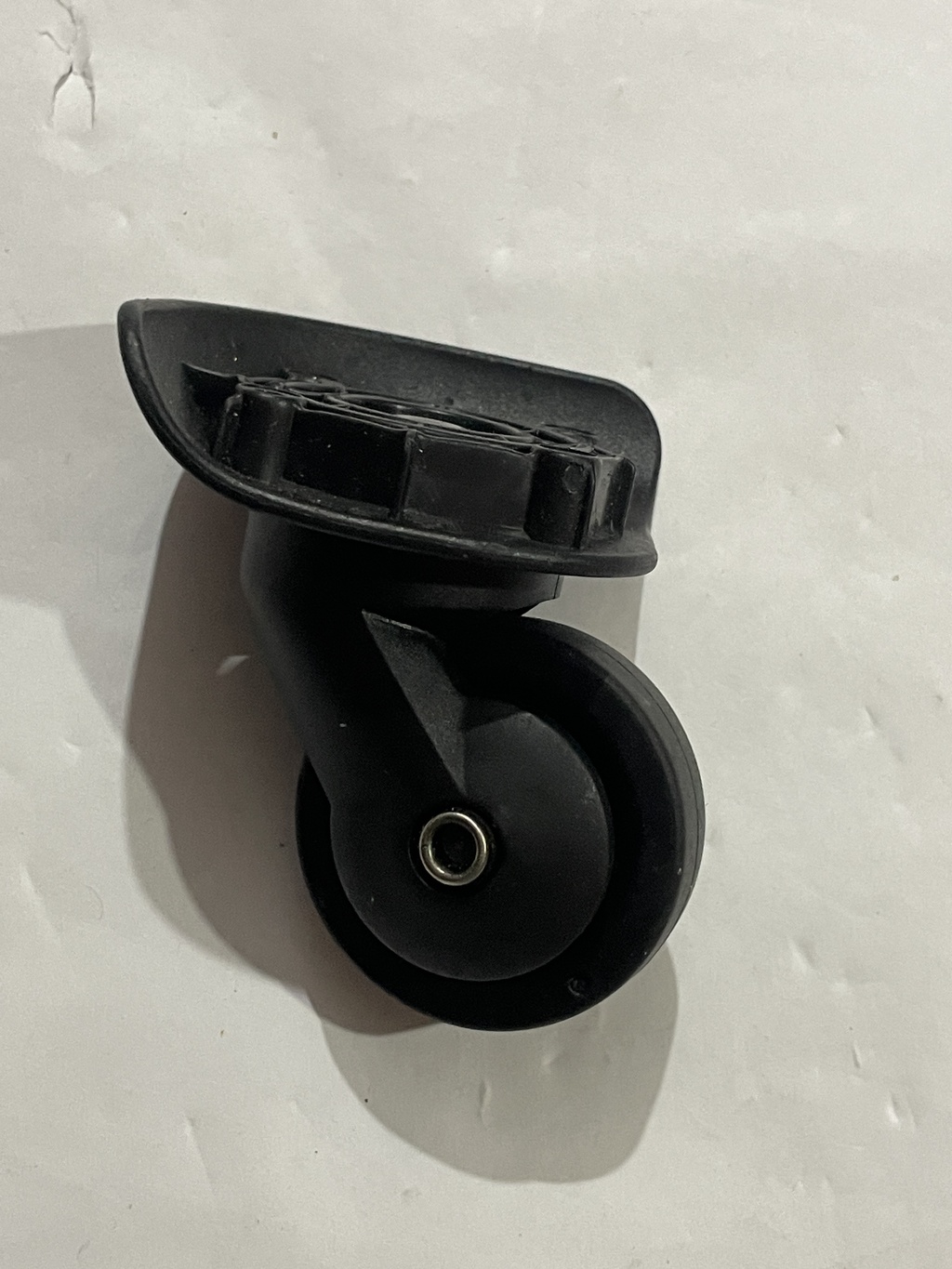Black Luggage Wheel Assembly